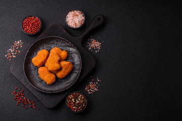 Chicken nuggets in breading, takeaway food, junk food