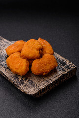 Chicken nuggets in breading, takeaway food, junk food