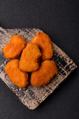 Chicken nuggets in breading, takeaway food, junk food