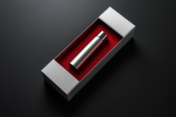 Minimalist product packaging with white box, red interior, and silver-capped cylindrical container on black background