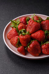 Strawberry, fresh juicy berries and fruits as background