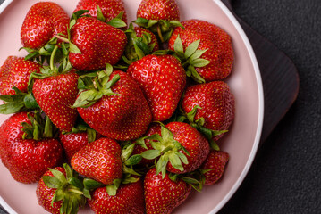 Strawberry, fresh juicy berries and fruits as background