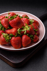 Strawberry, fresh juicy berries and fruits as background