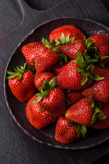 Strawberry, fresh juicy berries and fruits as background