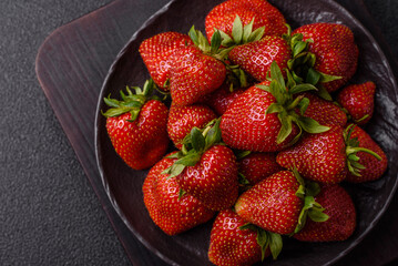 Strawberry, fresh juicy berries and fruits as background