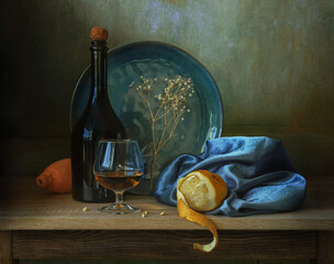 still life with lemons and a bottle of wine