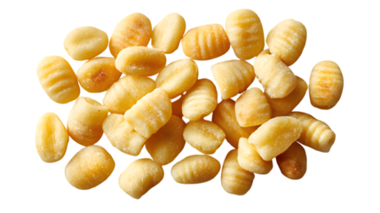 Delicious italian potato gnocchi scattered on a black background ready to be served as a gourmet appetizer or meal ingredient