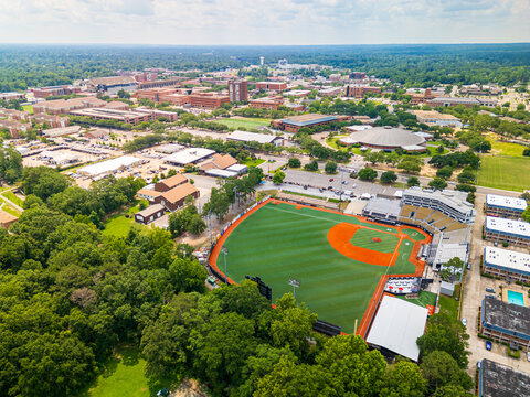 Pete Taylor Park, home of the  University of Southern Mississippi Golden Eagles baseball team, and campus skyline.