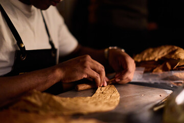 Cigar Maker Rolling Tobacco Leaf