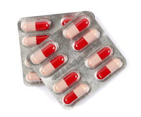 Tablets in strip isolated on white, top view	