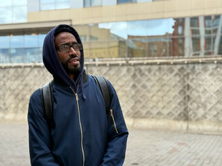 Portrait of a serious adult African American ethnicity man with a beard. A serious confident black...