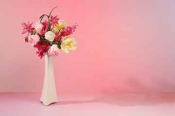 Still life with beautiful columbine flowers, cream rose and wild rose in vase on elegant modern table,Abstract flower arrangement. template for your design with place for text