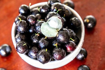 Beautiful and juicy ripe jabuticaba fruits in fine detail