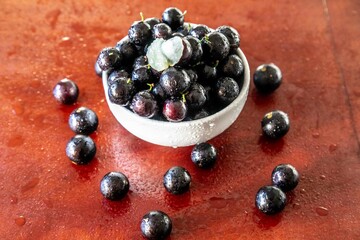 Beautiful and juicy ripe jabuticaba fruits in fine detail
