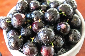 Beautiful and juicy ripe jabuticaba fruits in fine detail