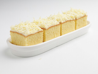 Vanilla sponge cheese cake on white background