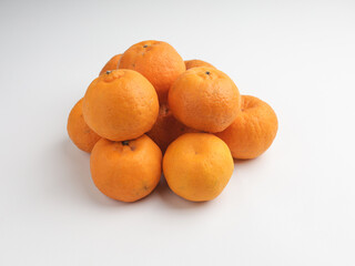 Mandarin oranges on white background