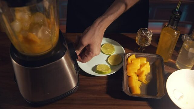 Spicy mango margarita prep 2 stage blending ingredients