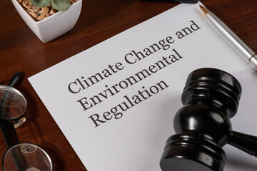 Climate Change and Environmental Regulation Document on Desk – Global Policy and Sustainability...