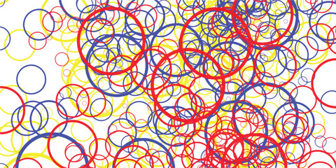 Abstract colorful circles overlapping in a dynamic composition with red yellow and blue colors on a white background creates a playful artistic design