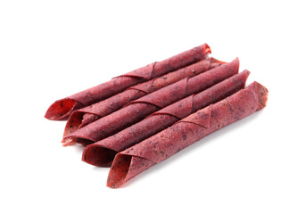 Delicious fruit leather rolls on white background