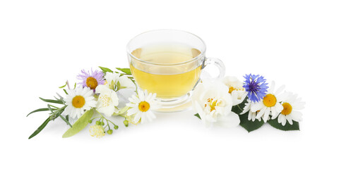 Aromatic herbal tea in glass cup and flowers isolated on white