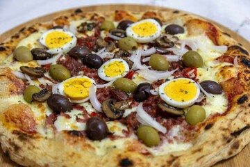 Original Brazilian pizza with olives, mushrooms, grated pepperoni, onion, red pepper, oregano and extra virgin olive oil