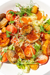 Colorful medley of fresh seafood, crisp vegetables, and quinoa creates a delightful culinary experience, beautifully arranged for a summer meal bursting with flavor