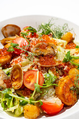 Vibrant greens mingle with tender shrimp and clams, adorned with juicy tomatoes and crunchy garnishes. This colorful salad is a feast for the eyes and palate during sunny days