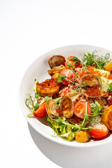 A beautifully arranged seafood salad featuring shrimp, clams, and fresh tomatoes. The vibrant greens and colorful vegetables create an inviting and appetizing dish perfect for a summer day