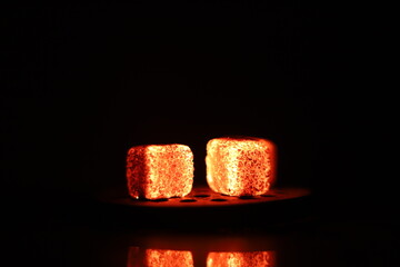 Glowing coals with glitch style lighting, enriched by noise, effect and grain details, create a...