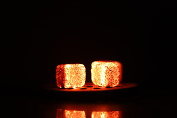 Glowing coals with glitch style lighting, enriched by noise, effect and grain details, create a...