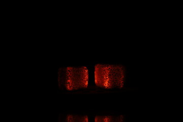 Glowing coals with glitch style lighting, enriched by noise, effect and grain details, create a...