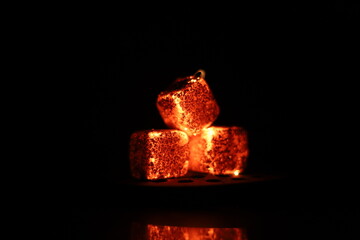Glowing coals with glitch style lighting, enriched by noise, effect and grain details, create a...