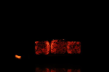 Glowing coals with glitch style lighting, enriched by noise, effect and grain details, create a...
