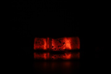 Glowing coals with glitch style lighting, enriched by noise, effect and grain details, create a...
