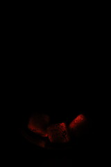 Glowing coals with glitch style lighting, enriched by noise, effect and grain details, create a...