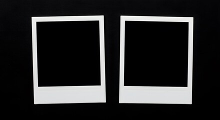 Two Blank White Instant Photo Frames Isolated on Black Background
