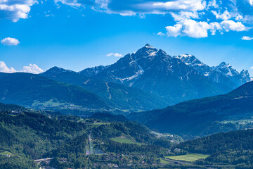 Stunning view of Serles peak with Bergisel ski jump and Wipptal valley from Hungerburg funicular car station  in spring on a sunny day, Innsbruck, Austria