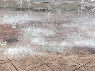 Water splashes from a fountain in the park,Salpicaduras de agua de una fuente en el parque (23