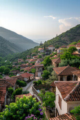 Fototapeta premium Stunning view of red rooftops in old town surrounded by breathtaking landscapes