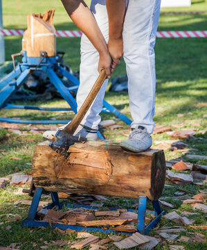 Young axeman competing in a woodchop competition