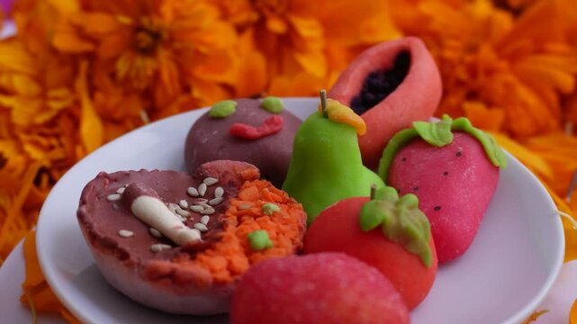 Sweets in the shape of fruit and food, Day of the Dead decorations in offerings
