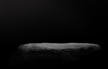 Stone podium on dark black background.