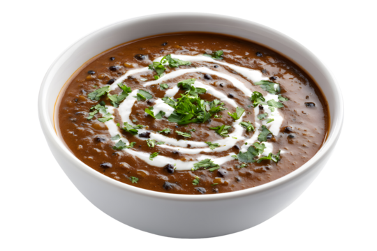 Traditional Indian dal makhani served in white bowl garnished with cream and fresh coriander leaves isolated on transparent background
