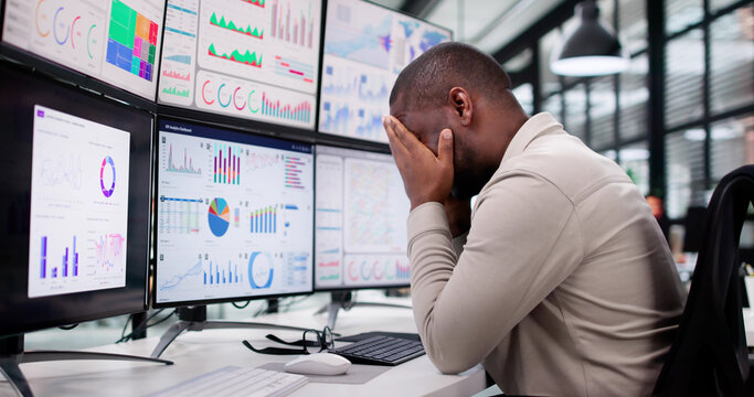 Stressed Accountant Overwhelmed By Financial Data