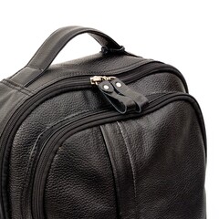 Naklejka premium Detail of black leather backpack isolated on white background, perfect for leather product catalog design