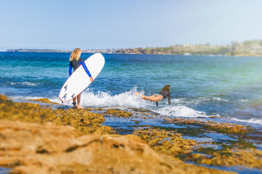 Two women going surfing