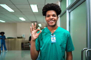Portrait of  young doctor working in a hospital. African American Healthcare Professionals. Portrait Of Smiling African Doctor  With Stethoscope In Hospital Office.