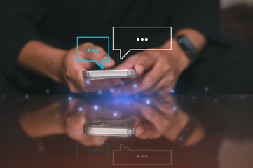 Social Media Man hand using smartphone typing live chat chatting on application communication digital web and social network concept. Social media application chat box